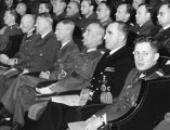 SS-Oberführer G. W. Müller, tysk propagandasjef i Norge under krigen, med rikskommissar Josef Terboven og NS-føreren Vidkun Quisling på samme rad, i Colosseum kino i Oslo 1944. Foto: Riksarkivet